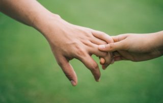 couple holding hands