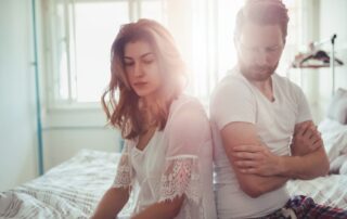 couple sitting in bed