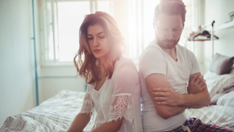 couple sitting in bed