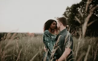 interracial couple in field