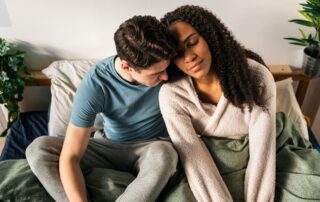 a sweet couple in bed