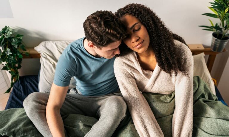 a sweet couple in bed