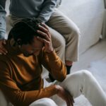 sad person being comforted