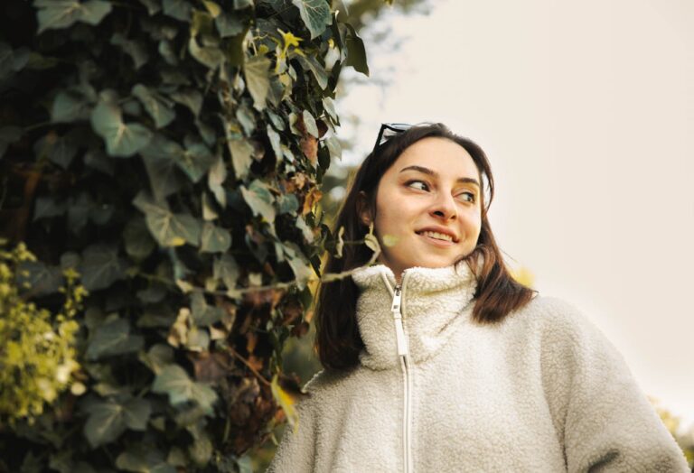 outdoor-portrait-of-woman-with-ivy-background