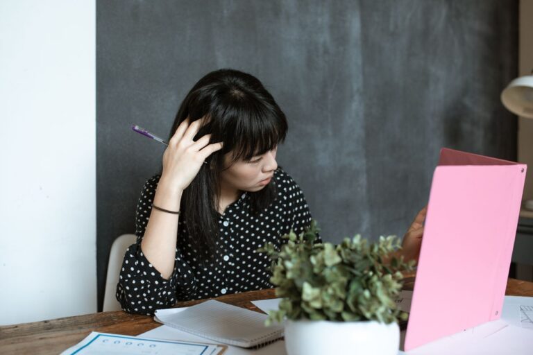 pensive-woman-at-work
