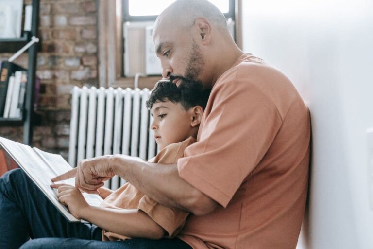 man-and-his-son-sitting-on-the-floor