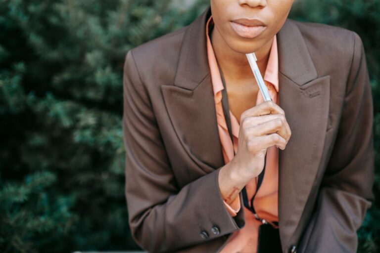 pensive-ethnic-woman-touching-chin-while-thinking-on-problem